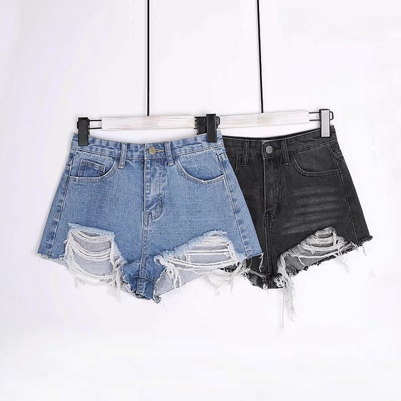 Shorts de mezclilla rasgados con borde sin rematar NSAC16272