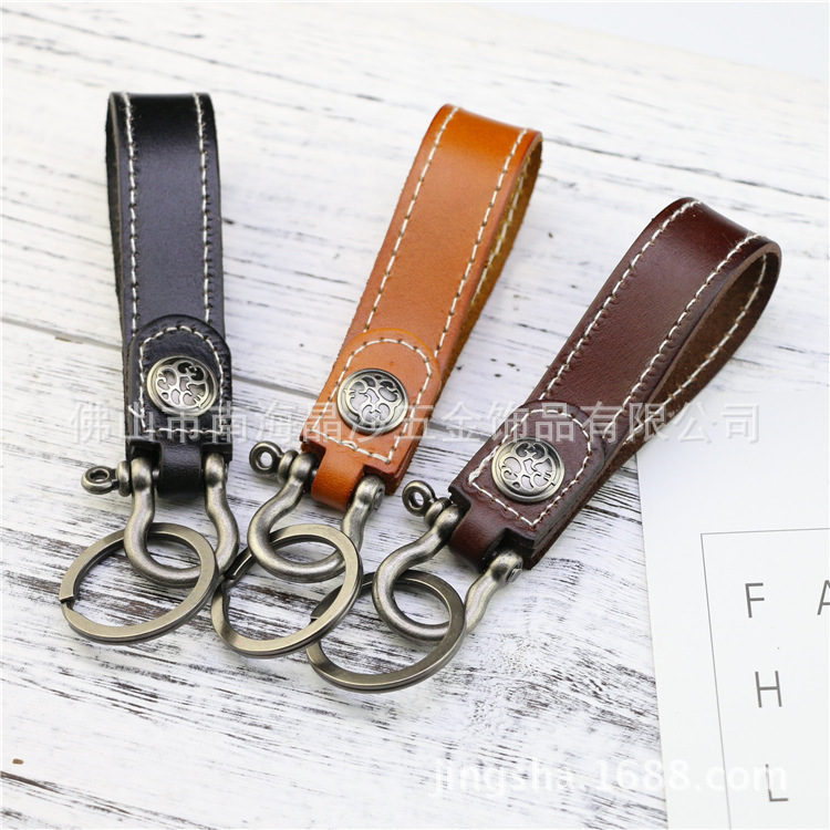 Factory direct new car key chain handmade real leather key chain pendant metal key ring small gift Factory direct new car key chain handmade real leather key chain pendant metal key ring small gift