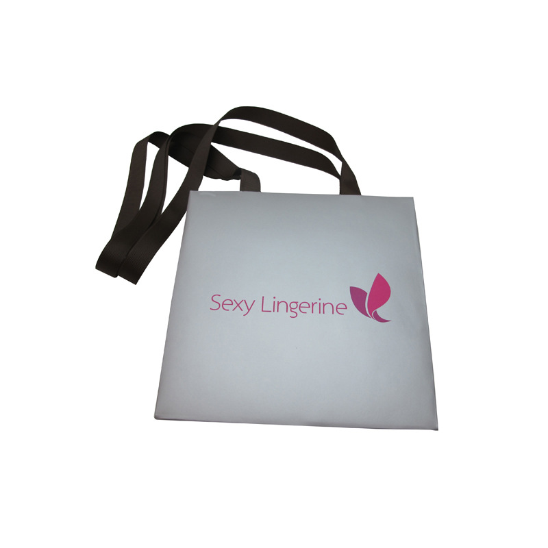 印刷白牛皮纸袋 专色雪白服装手提袋 童装服装店袋子 婴儿礼品袋