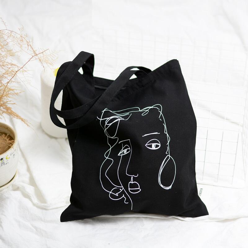 2021 Nuevo estilo fresco retrato abstracto bolsa de lona artístico fresco bolso de compras de las mujeres bolso de hombro del estudiante