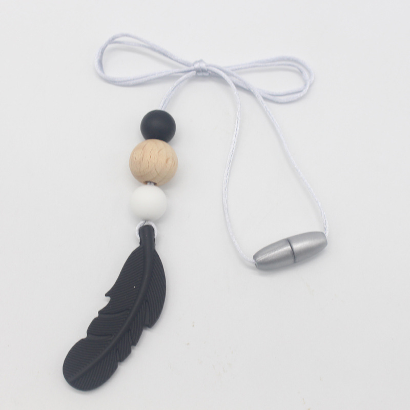 Amazon nueva pluma mordedor collar bebé calmante molar silicona seguridad ambiental Beech bead collar