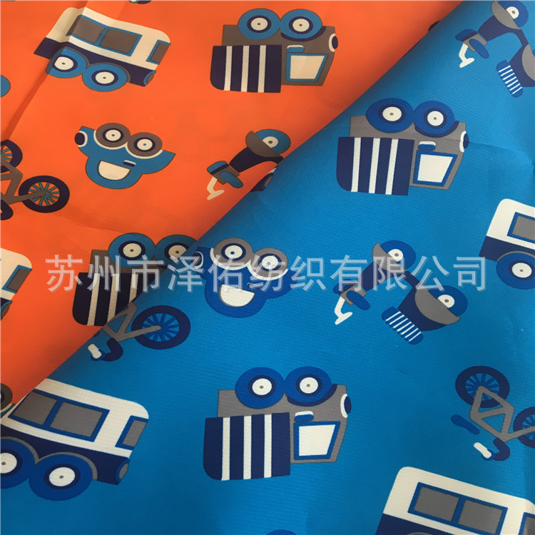 童装卡通印花面料小汽车卡通印花布童装格子面料里料