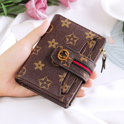 2018 new pattern Europe and America lady wallet have cash less than that is registered in the accounts Card position Buckle printing Wallet Wallet On behalf of