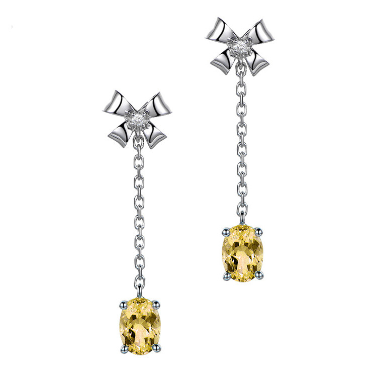 Platinum organic copper earrings with bow with zircon