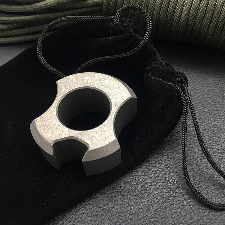 superior quality Metal Knuckles Self-defense supplies Titanium Fist buckle Key pendant Bottle opener Cross border Source of goods