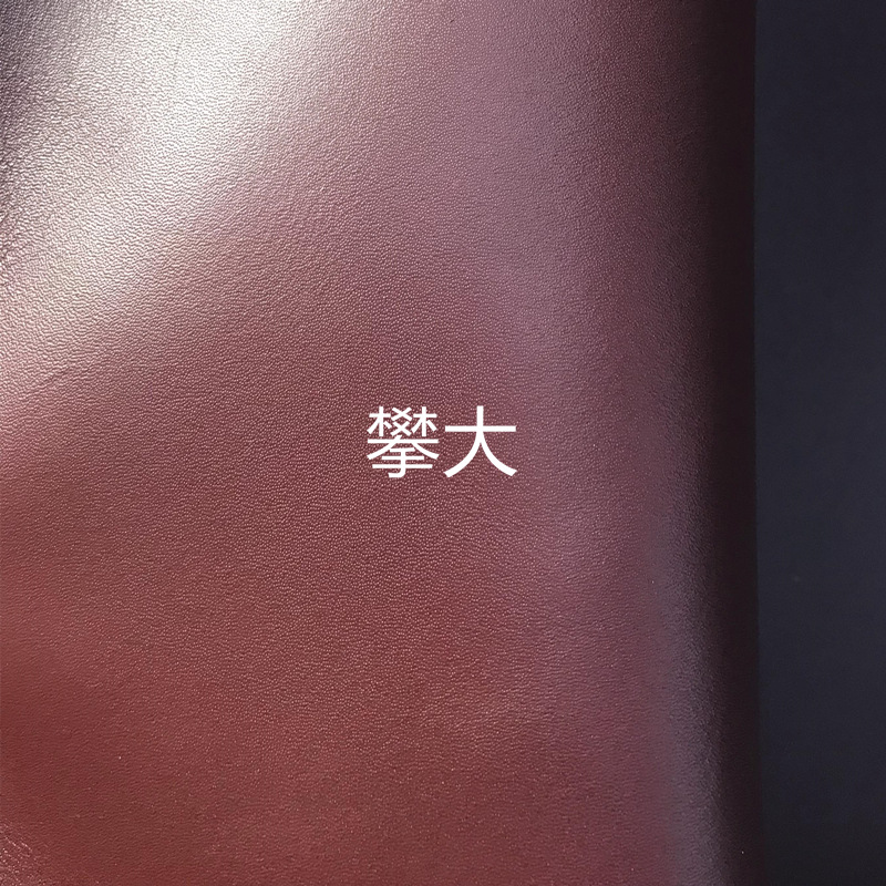 酒红色头层牛皮 底部透明树脂处理过 可用于流苏 箱包 服装 饰品
