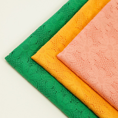 蕾丝面料低价促销 连衣裙提花面料 童装涤纶蕾丝 针织面料