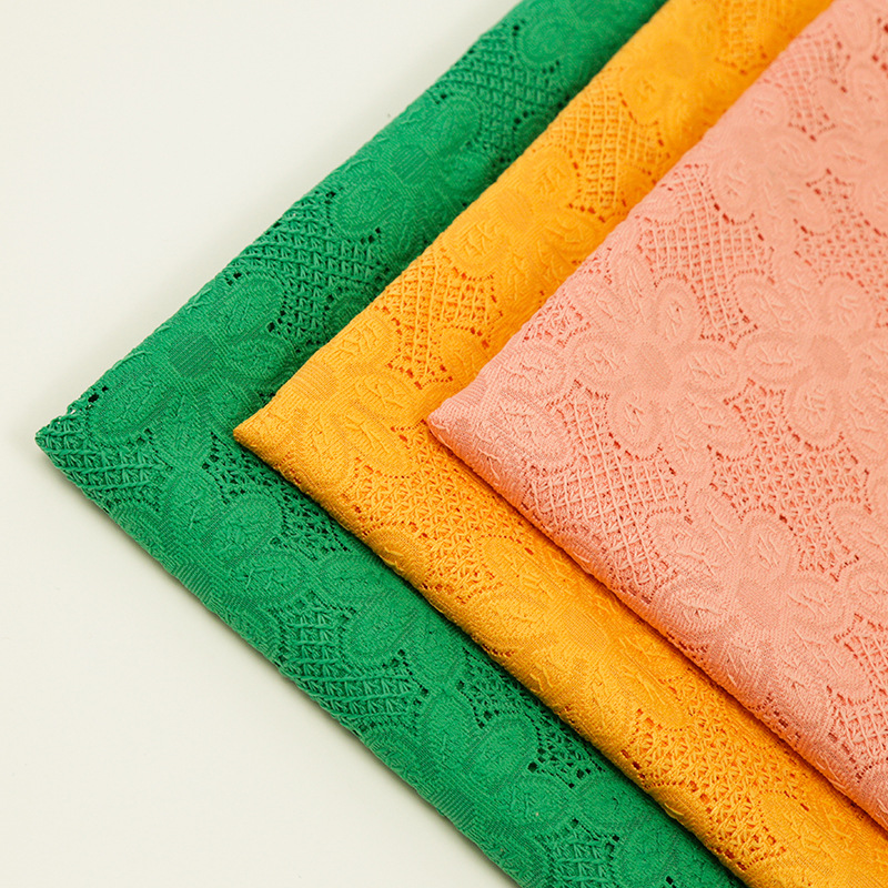 蕾丝面料低价促销 连衣裙提花面料 童装涤纶蕾丝 针织面料