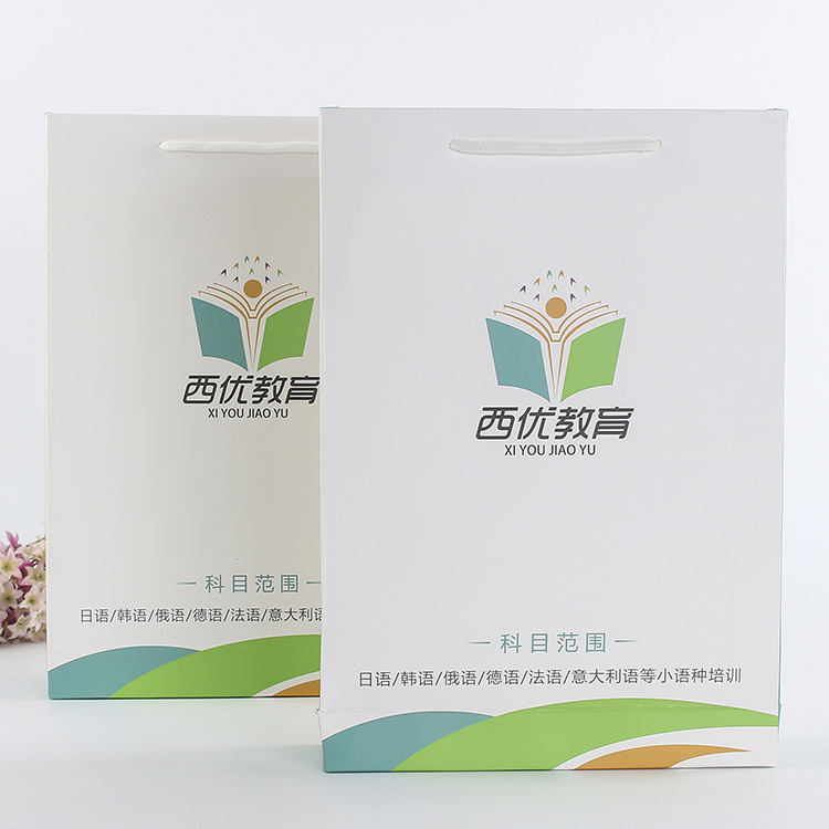 批发现货包装纸袋定做白卡礼品袋定制服装购物袋广告手提袋印logo