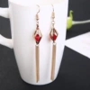 Red diamond gold -colored ear hook