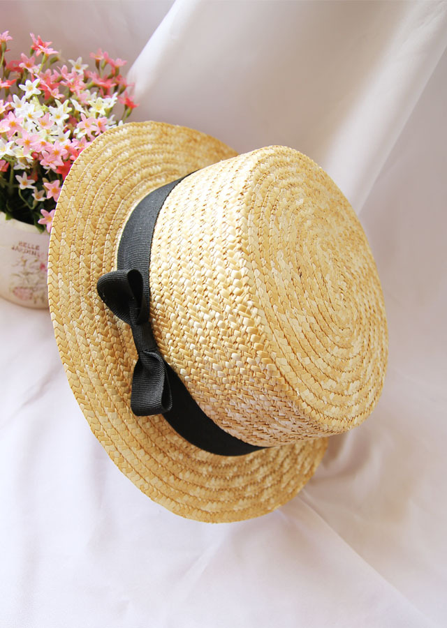 Unisex Vacation Solid Color Flat Eaves Straw Hat display picture 1