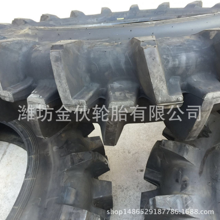 长期供应16.9-38 泰山农用拖拉机专用水田高花轮胎 耐磨防滑
