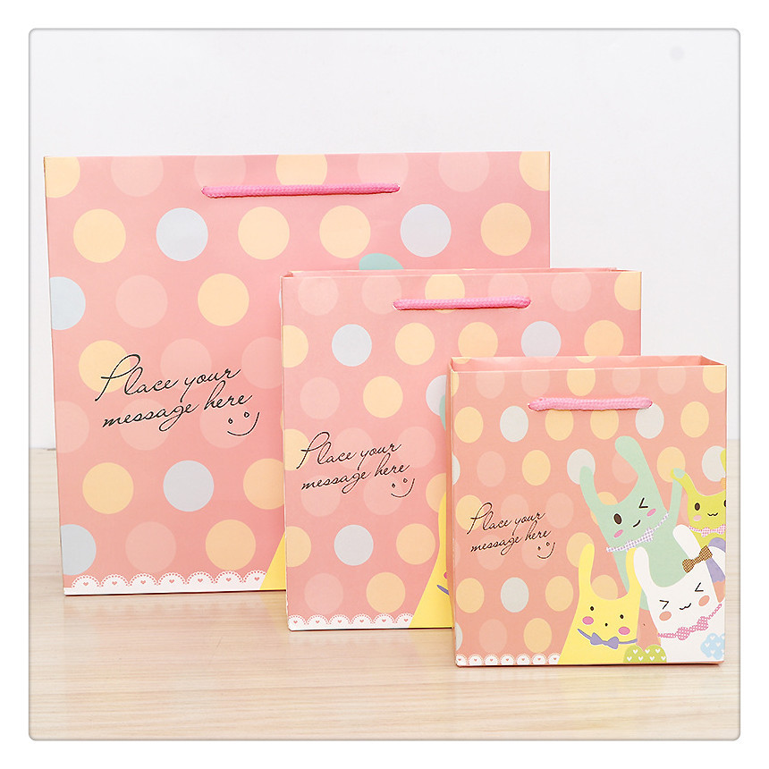 大量生产 白卡纸广告促销手提袋 可爱粉色波点女装童鞋服装购物袋