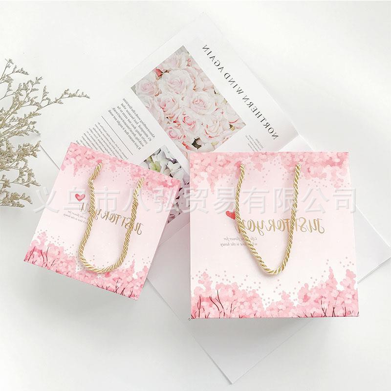 厂家批发服装购物手提袋 粉色纸袋 简约礼品包装 可印刷烫金logo