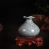 Ge kiln with thread pink green
