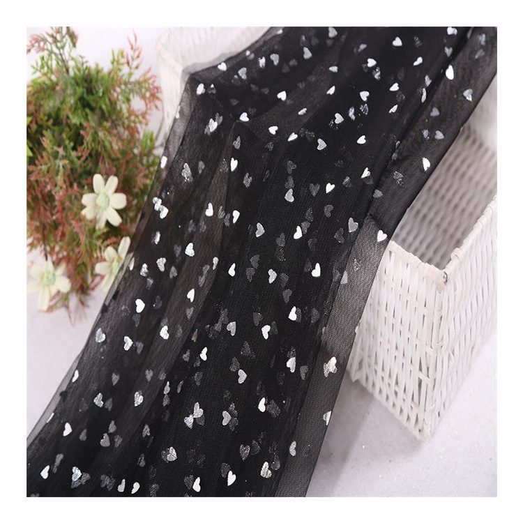 Fabricante de suministro de tela de malla hexagonal tela de malla de amor estampado ropa de rendimiento ropa de mujer ropa de niños tela de decoración