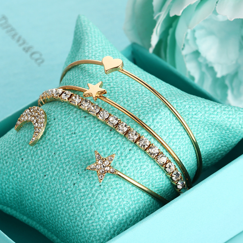Fashion New  Simple Diamond Crystal Star Moon Four-piece  Alloy Bracelet Wholesale display picture 1