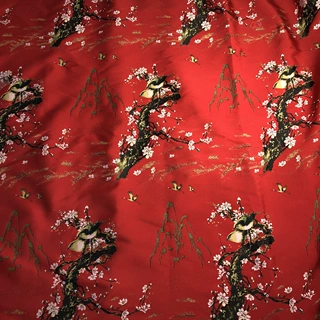 秋冬新品织有喜鹊登枝喜庆图案的时尚提花服装面料色织面料