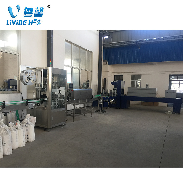 厂家直销：全套瓶装水设备 瓶装水套标机 矿泉水全自动套标机