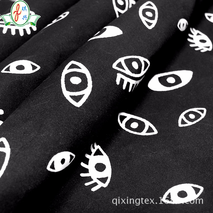 顺德厂家全涤沙滩裤面料涤纶热升华印花黑色数码印花男士泳裤布料