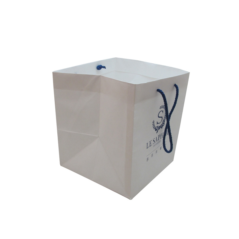 白牛皮手提袋印刷 服装纸袋 纯白色礼品包装袋 专色白面牛皮纸袋