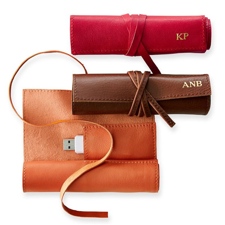 批量头层牛皮卷帘耳机数据线收纳包 多功能绑带收纳袋