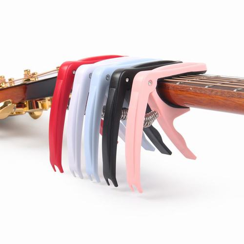 Plastic dual-purpose capo, ABS guitar capo, one-clip dual-purpose capo, string pegs