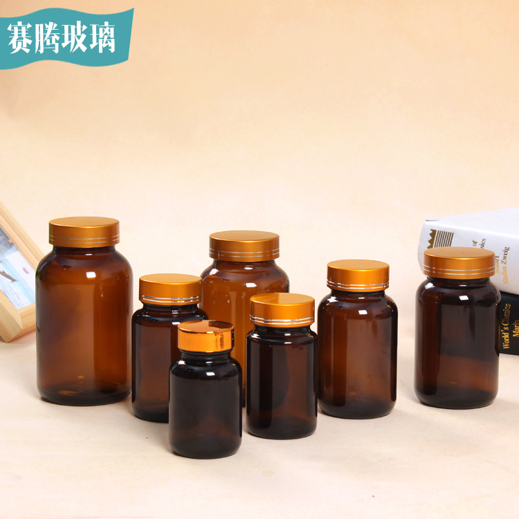 goods in stock Direct selling high-grade Glass Capsule Bottle Tan capsule Glass Pill bottle Glass Bottle Health care products bottle