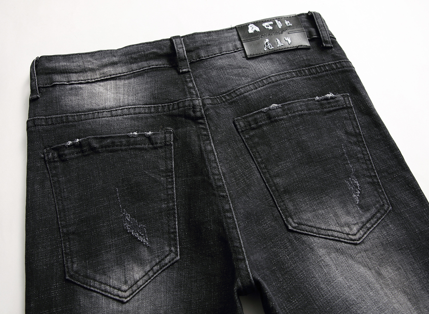 Pantaloni da uomo elastici neri di alta qualità con toppe rovinate, pantaloni da uomo personalizzati e alla moda_voghion.com