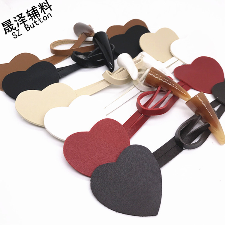 厂家批发 桃心牛角皮对扣 休闲风衣大衣外套皮袢扣 桃形服装装饰