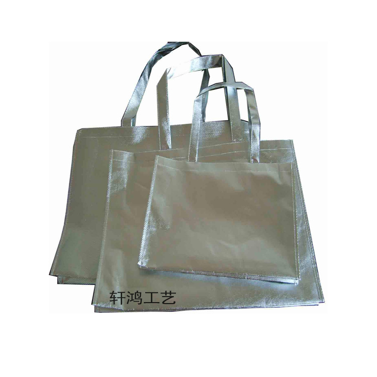 镀膜镭射手提包装袋 镭射压纹防水购物袋 金银玫红色手提服装鞋袋