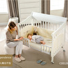 Universal children's white crib for side table from natural wood
