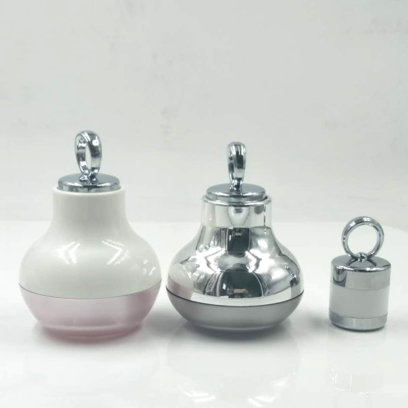 厂家直销新款50g感应式震动膏霜瓶自带led发光按摩导入仪面霜瓶