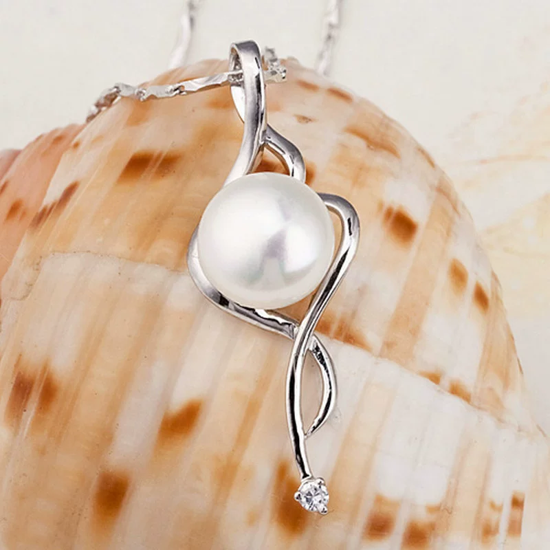 Organic pendant from pearl, simple and elegant design, silver 925 sample