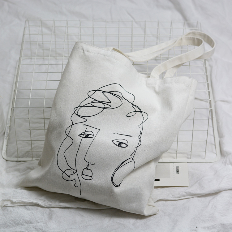 2021 Nuevo estilo fresco retrato abstracto bolsa de lona artístico fresco bolso de compras de las mujeres bolso de hombro del estudiante