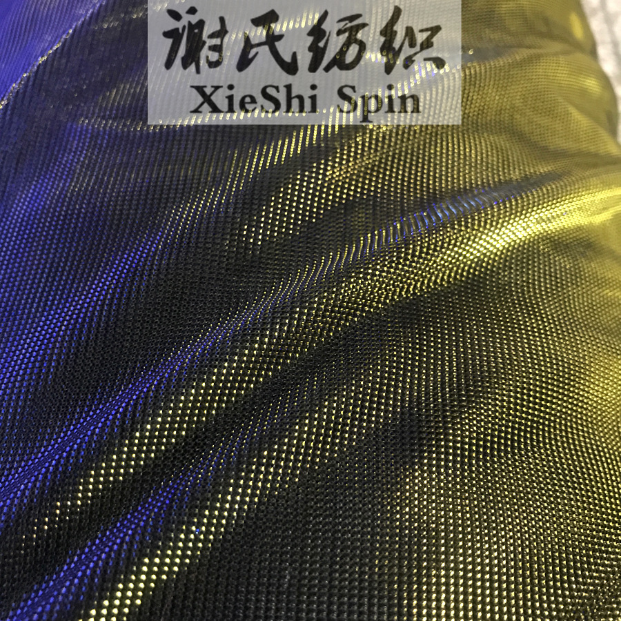 新春夏电光布料 蓝金色闪点蓬松弹力网纱拉丝面料 透视夜店装面料