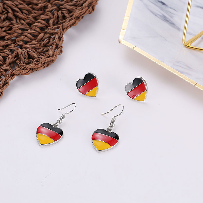 Cute Heart-shaped Earrings Peach Heart Earrings Female Wild Color Drip Oil Love Earrings display picture 5