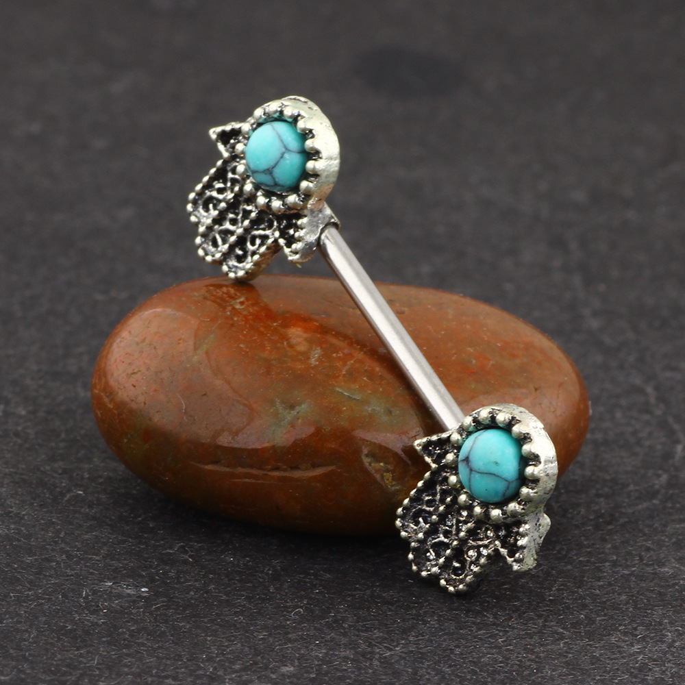 Silver pointed spike labret stud material detail