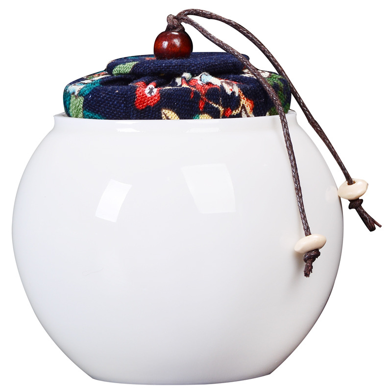 Winjiang blanco porcelana sellada tarro de té Corcho de cerámica sellado tarro pequeño tamaño Pu'er almacén de té ovejas grasa Jade porcelana tarro de té