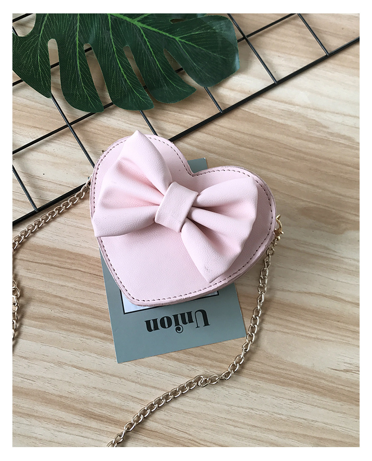 Unisex Small Pu Leather Solid Color Bow Knot Cute Heart-shaped Zipper Crossbody Bag display picture 42