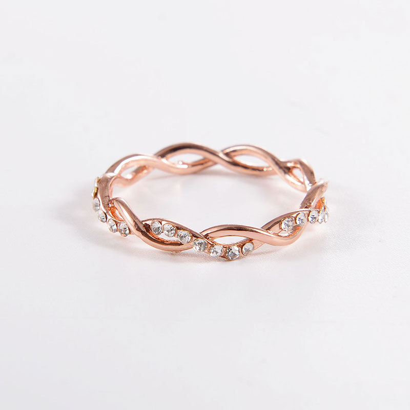 Fashion Simple Diamond Twist Ring Ms. Environmentally Friendly Copper Diamond Twisted Bridal Ring display picture 7