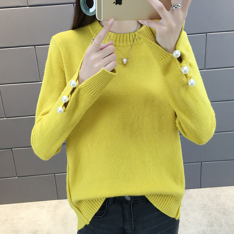 秋冬时尚女装毛衣女2018秋冬新款手臂钉珍珠打底衫前短后长针织衫