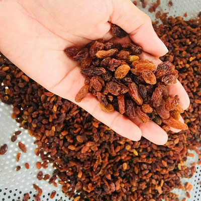 Place of Origin Direct selling Xinjiang Red grapes Disposable Xinjiang specialty Baking ingredients class a Red rose Raisins 10 kg .