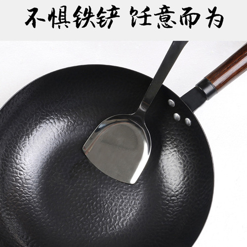 Household old-fashioned pure iron wok without coating, stir-frying pan featured in 