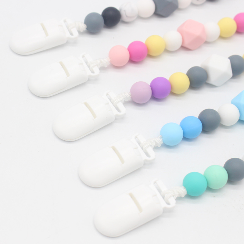 INS popular cadena de chupete suministros para bebés clip de chupete de silicona Amazon mordedor cadena anti-caída cinturón