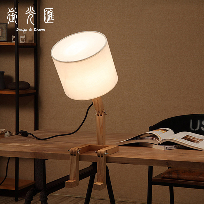 Northern Europe solid wood lamps and lanterns bedroom a living room modern Simplicity adjust Posture Doll Table lamp originality Night light