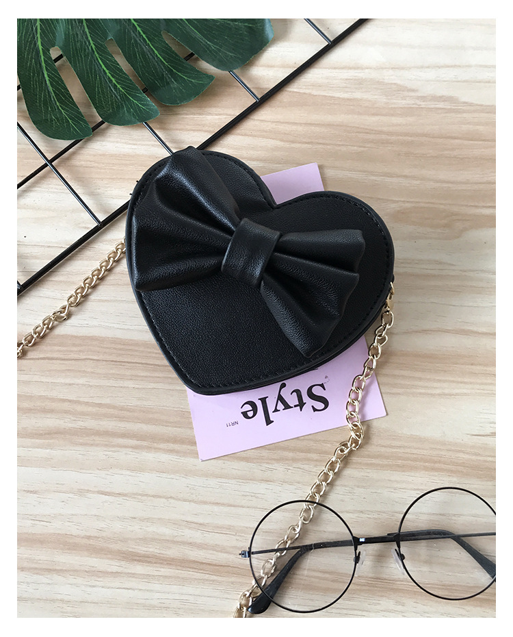 Unisex Small Pu Leather Solid Color Bow Knot Cute Heart-shaped Zipper Crossbody Bag display picture 40