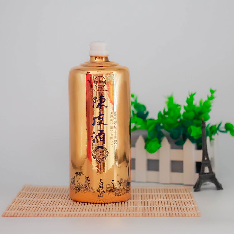 厂家供应500ml乳白料镀金白酒瓶 批发一斤装电镀金烤黑字玻璃瓶子