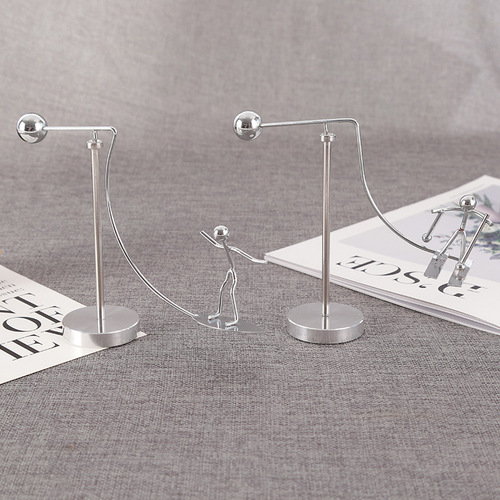 Surfing and skiing shaped rotating iron man, tumbler balancing figure, desktop decoration, stress relief gadget