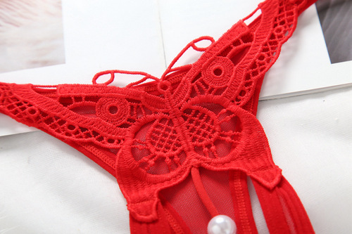 Pearl massage thong low waist embroidered hollow sexy underwear for women European and American hot crotchless t-pants